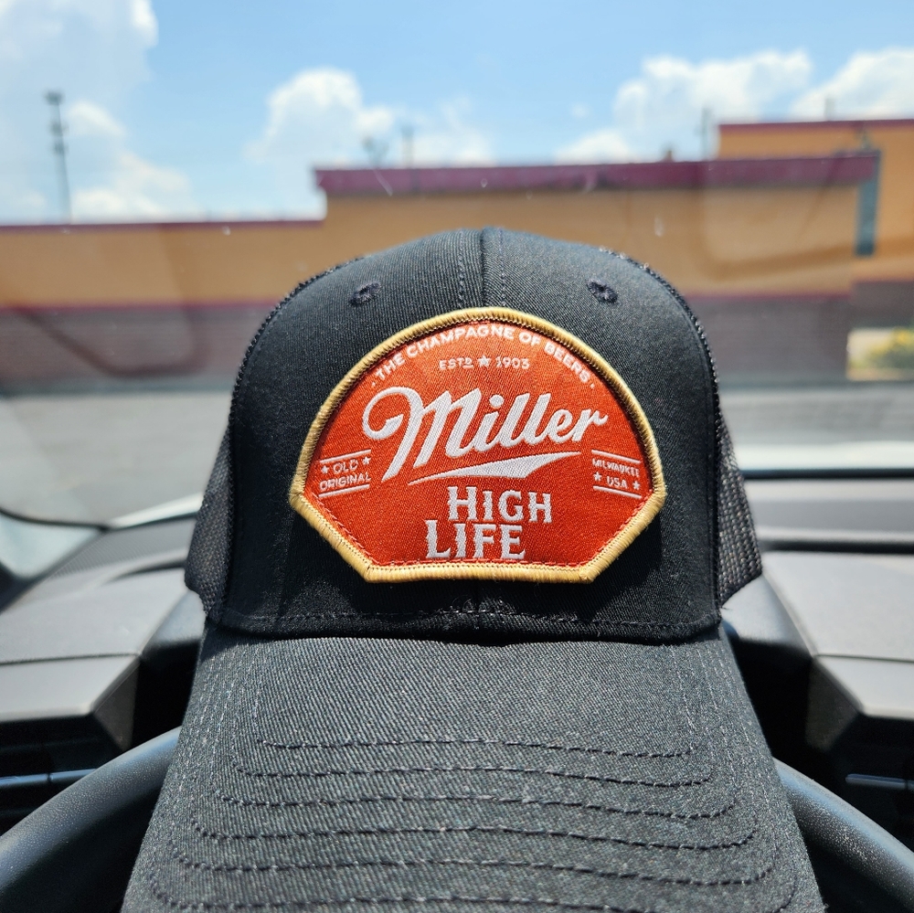 Authentic miller Cap. With adjustable band.